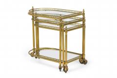 Maison Jansen Set of 3 Maison Jansen Mid Century French Brass Rolling Nesting Tables - 4274101