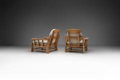 Maison Regain Pair of French Elm Wood Lounge Chairs by Maison Regain France 1970s - 4294919