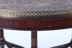 Maitland Smith A Maitland Smith crotch mahogany center table having a tessellated marble top  - 3430001