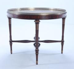 Maitland Smith A Maitland Smith crotch mahogany center table having a tessellated marble top  - 3430002