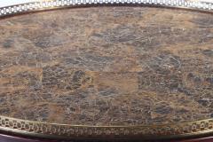 Maitland Smith A Maitland Smith crotch mahogany center table having a tessellated marble top  - 3430007