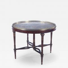 Maitland Smith A Maitland Smith crotch mahogany center table having a tessellated marble top  - 3431214
