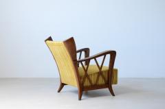 Maurizio Tempestini Elegant oak armchair with wavy pattern on all sides  - 3387242