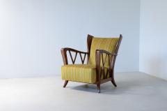 Maurizio Tempestini Elegant oak armchair with wavy pattern on all sides  - 3387287