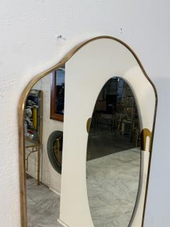 Mid Century Brass Framed Wall Mirror with Curved Silhouette 1960s - 4291988