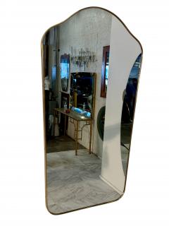 Mid Century Brass Framed Wall Mirror with Curved Silhouette 1960s - 4291992