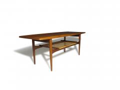 Mid Century Danish Teak Two Tier Coffee Table with Sculpted Edges Caned Shelf - 4084740