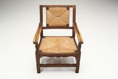 Mid Century Handcrafted Wood and Woven Straw Armchairs Europe ca 1950s - 2787024