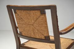 Mid Century Handcrafted Wood and Woven Straw Armchairs Europe ca 1950s - 2787027