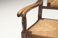 Mid Century Handcrafted Wood and Woven Straw Armchairs Europe ca 1950s - 2787036