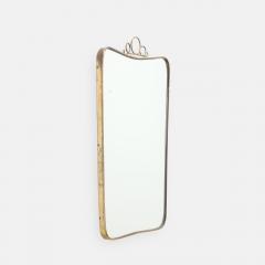 Mid Century Italian Modernist Shaped Brass Mirror with Scroll Crest - 4754042