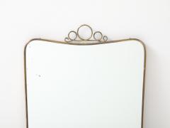 Mid Century Italian Modernist Shaped Brass Mirror with Scroll Crest - 4754043