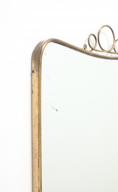 Mid Century Italian Modernist Shaped Brass Mirror with Scroll Crest - 4754044
