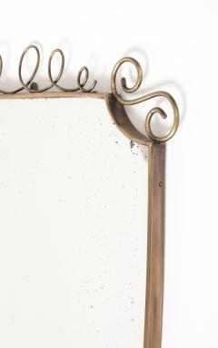 Mid Century Italian Shield Shaped Brass Wall Mirror with Scroll Crest - 4736536