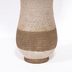 Mid Century Modern Ceramic Table Lamp with Arcade Detailing and Raw Fiber Shade - 2909091