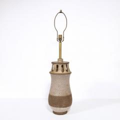 Mid Century Modern Ceramic Table Lamp with Arcade Detailing and Raw Fiber Shade - 2909176
