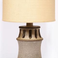 Mid Century Modern Ceramic Table Lamp with Arcade Detailing and Raw Fiber Shade - 2909181