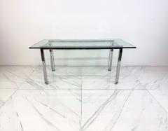 Mid Century Modern Polished Stainless Steel and Glass Dining Table - 4557397