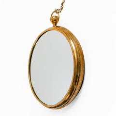 Mid Century Modern brass mirror in the manner of Fornasetti - 1980525