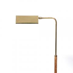 Mid Century Modernist Articulating Polished Brass and Ratan Wrapped Floor Lamp - 3600021