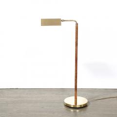 Mid Century Modernist Articulating Polished Brass and Ratan Wrapped Floor Lamp - 3600030