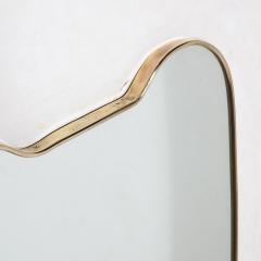 Mid Century Modernist Brass Wrapped Shield Form Mirror - 3443205