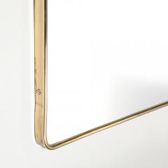 Mid Century Modernist Elongated Brass Wrapped Mirror with Curved Top Detailing - 4347460