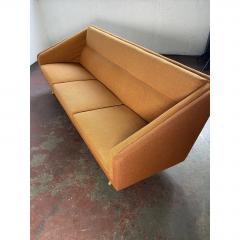 Mid Century Orange Sofa with Maple Legs - 1692105