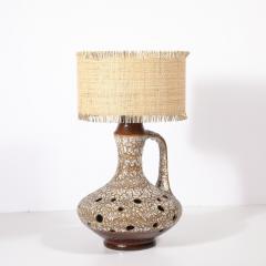 Mid Century Organic Pitcher Form Ceramic Table Lamp with Illuminated Cutouts - 4347566