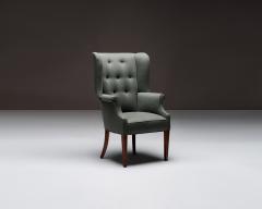 Mid Century Wingback Chair with Brass Buttons United States c 1950 - 4694903