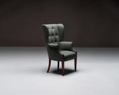 Mid Century Wingback Chair with Brass Buttons United States c 1950 - 4694904