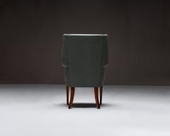 Mid Century Wingback Chair with Brass Buttons United States c 1950 - 4694905