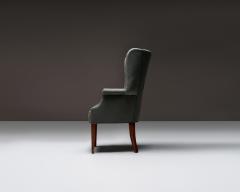 Mid Century Wingback Chair with Brass Buttons United States c 1950 - 4694906