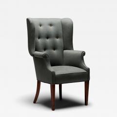 Mid Century Wingback Chair with Brass Buttons United States c 1950 - 4695362