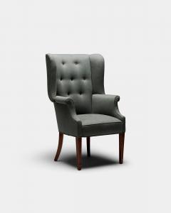 Mid Century Wingback Chair with Brass Buttons United States c 1950 - 4695367