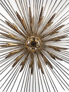 Mid Century gilt metal sunburst with spoke and wheat design - 4665499