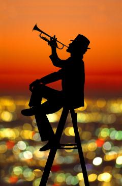 Mitchell Funk Joyful Jazz Trumpet Player in Silhouette at Orange Sunset in Los Angeles - 3163897