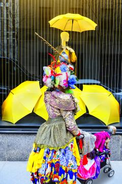 Mitchell Funk Street Photography of Eccentric Women with Colorful Cloths and Yellow Umbrellas - 3162578