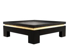 Modern Black Coffee Table with Gold Leaf Accents - 3627681