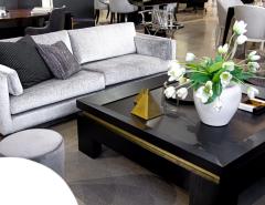 Modern Black Coffee Table with Gold Leaf Accents - 3627683