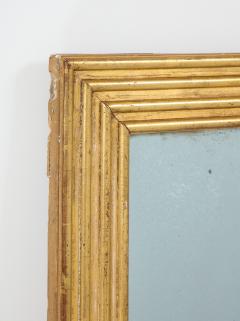 Neoclassical Italian gilded rectangular mirror with ribbed carving - 1013822