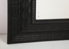 Northern Italian ripple and wave carved and ebonized mirror frame - 1013235