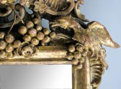 Ornately Carved French Rococo Gilt wood Mirror with Exuberant Crest - 3231167