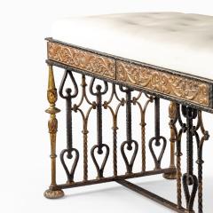 Oscar Bruno Bach A long parcel gilt wrought iron stool attributed to Oscar Bach - 2117849