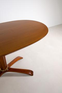 Osvaldo Borsani Osvaldo Borsani oval table in cherry wood w nice central base w helical shape - 2278260
