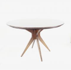 Osvaldo Borsani Osvaldo Borsani round dining table walnut four feet circa 1951 - 4132696