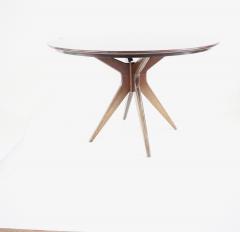 Osvaldo Borsani Osvaldo Borsani round dining table walnut four feet circa 1951 - 4132697