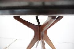 Osvaldo Borsani Osvaldo Borsani round dining table walnut four feet circa 1951 - 4132701