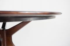 Osvaldo Borsani Osvaldo Borsani round dining table walnut four feet circa 1951 - 4132703