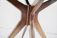 Osvaldo Borsani Osvaldo Borsani round dining table walnut four feet circa 1951 - 4132704